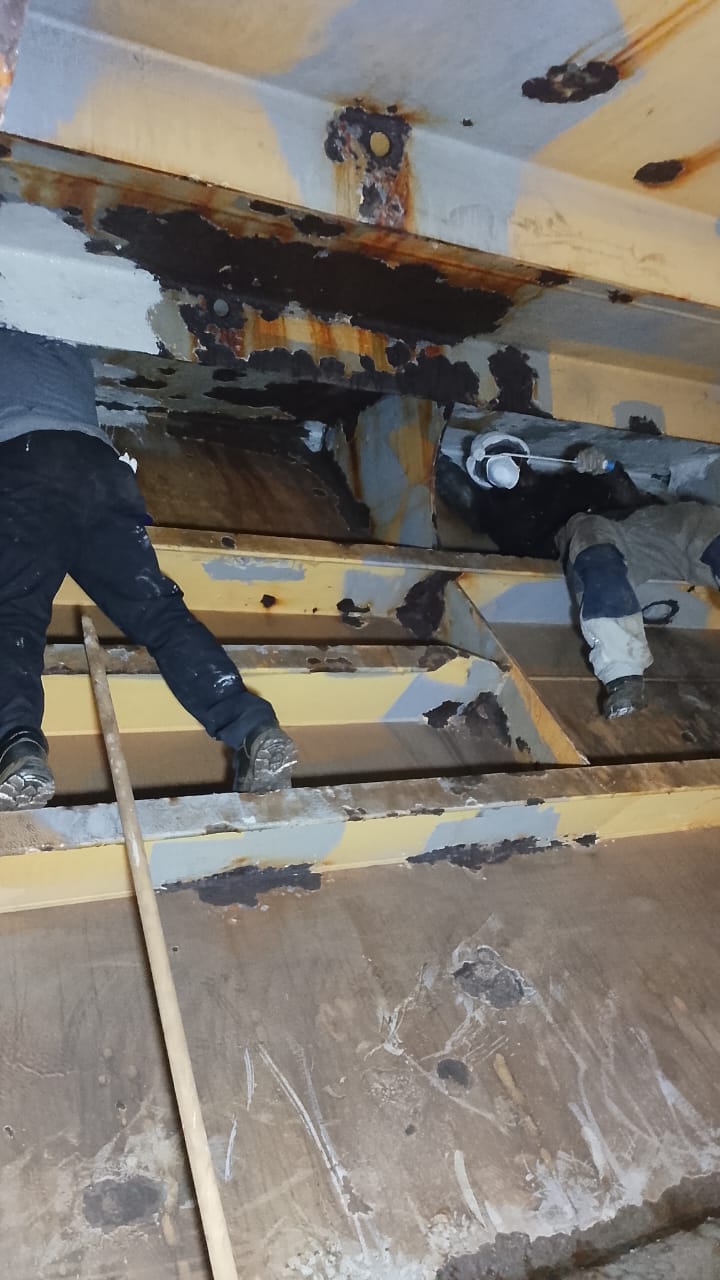 Chipping and painting, ship maintenance