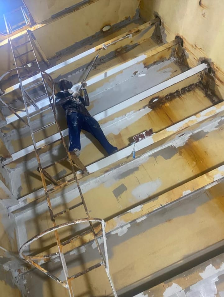 Chipping and painting, ship maintenance